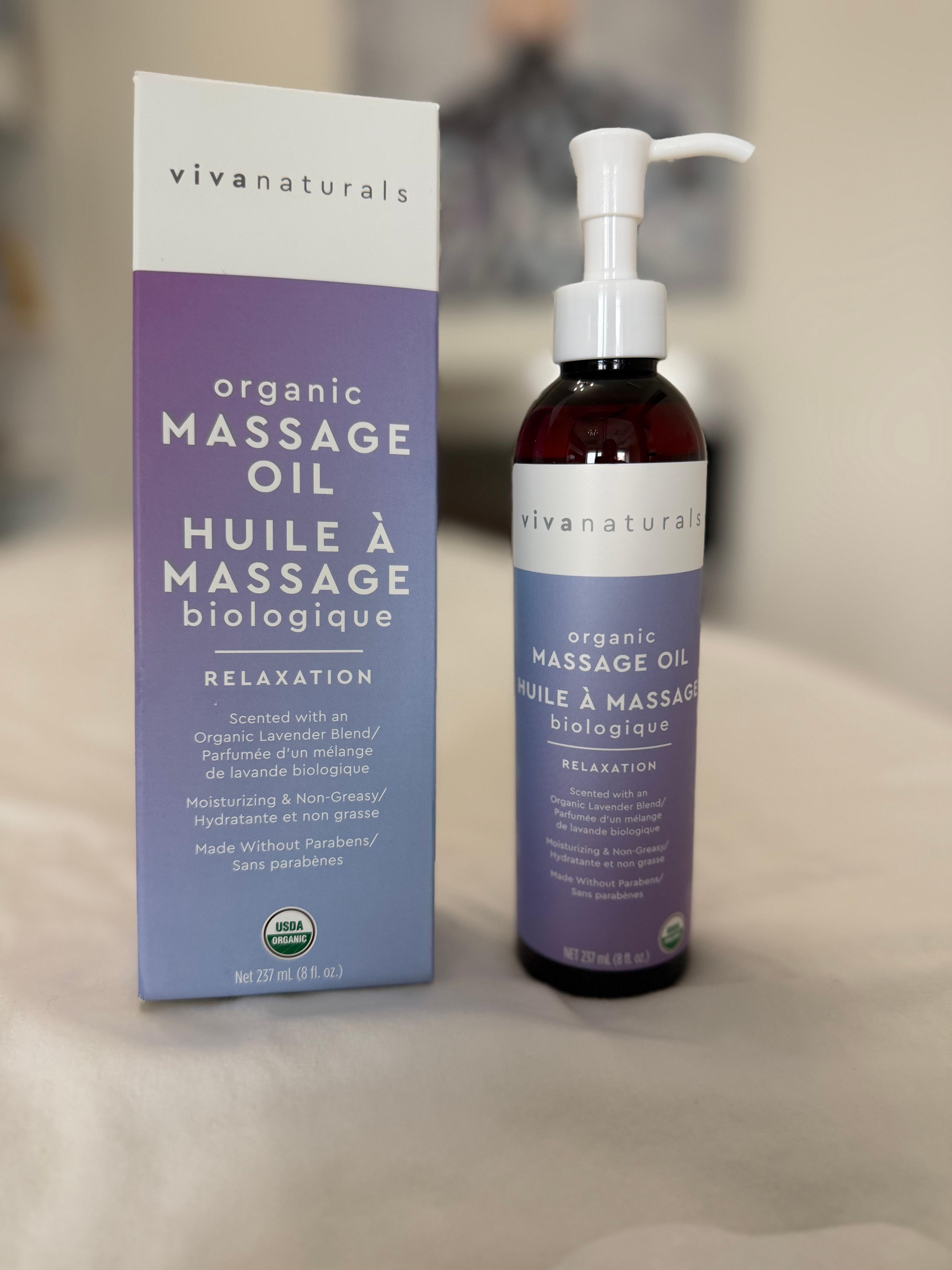 Viva Naturals Organic Relaxation Massage Oil bottle with pump beside its box on a white surface, featuring lavender-toned packaging and a calming, clean product display.
